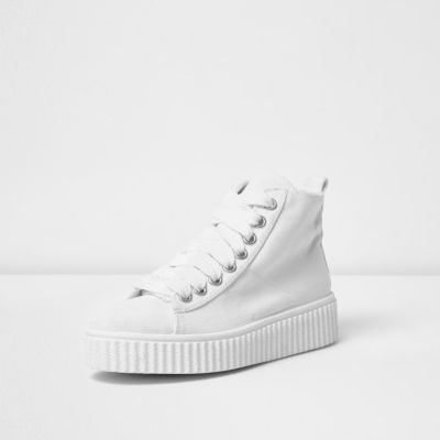 White chunky sole high top trainers